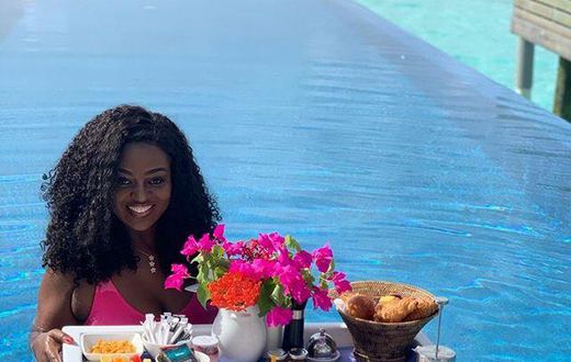 Ghanaian actress, Jackie Appiah enjoys her breakfast  in the Pool