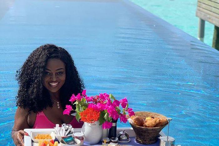 Ghanaian actress, Jackie Appiah enjoys her breakfast  in the Pool