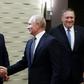 Russian President Vladimir Putin greets US Ambassador to Russia Jon Huntsman