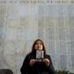 Juana Cerda, daughter of Cesar Cerda who disappeared during the 1973-1990 military dictatorship of Augusto Pinochet in Chile, holds up an image of her father on May 16, 2019