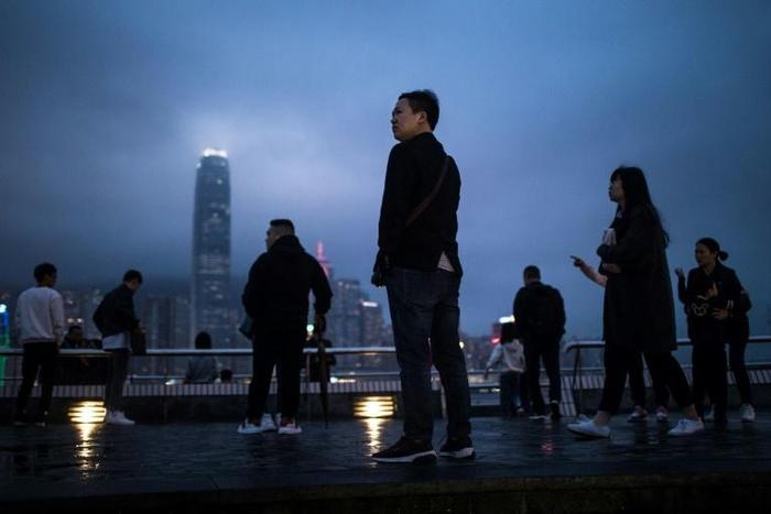 Hong Kong investors have been warned of dark days ahead as increasingly violent protests continue across the city