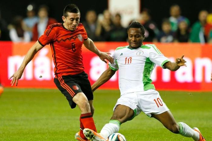 Obi Mikel (R, pictured March 2014) won his first Africa Cup winners' medal in South Africa in 2013, after finishing third in 2006 and 2010