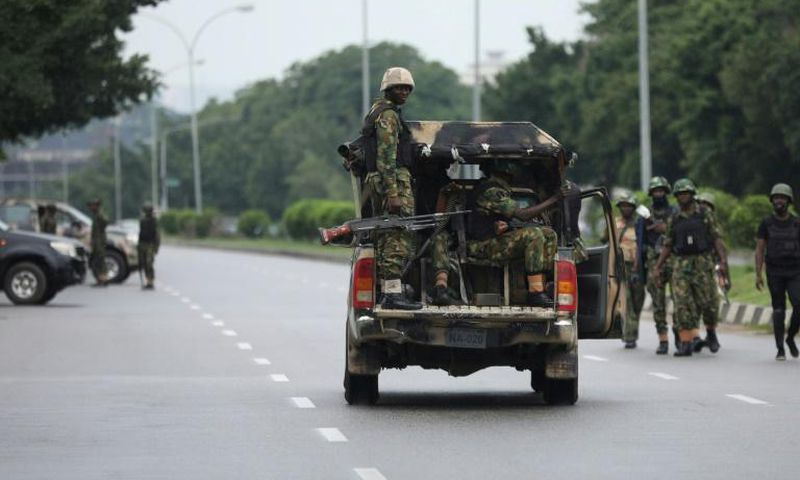 Soldiers aboard a truck patrol during a violent protest by Shiite Muslims demanding the release of their detained leader Ibrahim Zakzaky on July 23, 2019 in Abuja