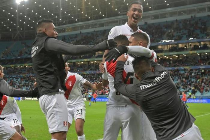 Peru's Paolo Guerrero celebrates after his goal seals a 3-0 upset over champions Chile at the Copa America