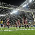 Brazil's Philippe Coutinho celebrates before his goal against Venezuela is disallowed after a VAR ruling