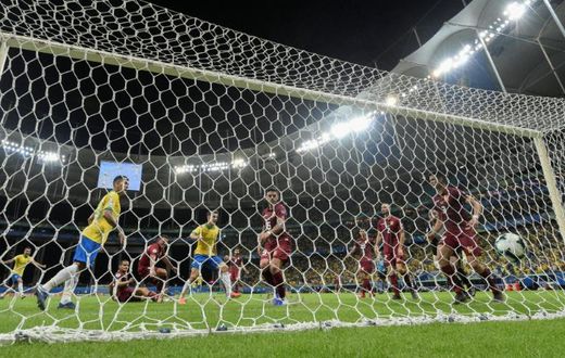 Brazil's Philippe Coutinho celebrates before his goal against Venezuela is disallowed after a VAR ruling