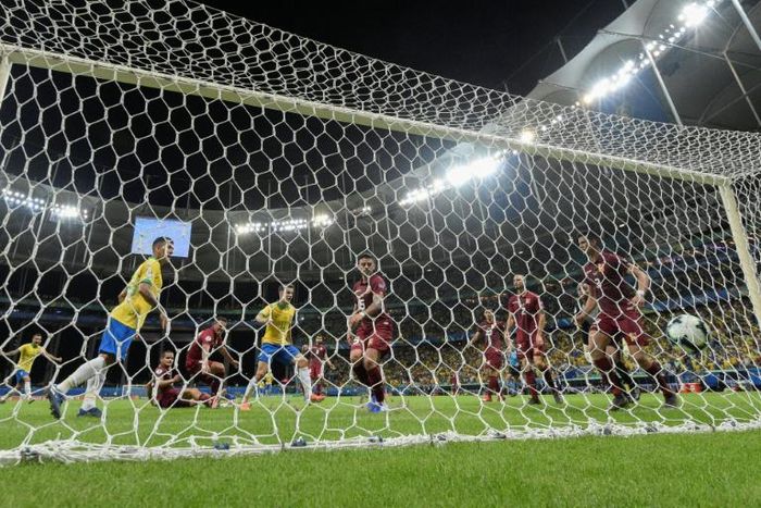 Brazil's Philippe Coutinho celebrates before his goal against Venezuela is disallowed after a VAR ruling