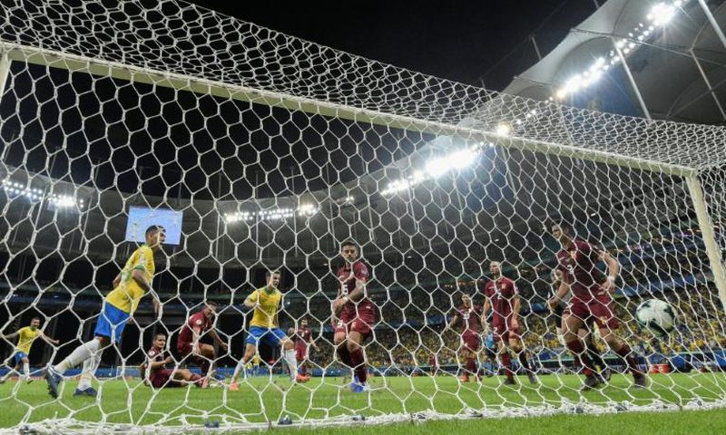 Brazil's Philippe Coutinho celebrates before his goal against Venezuela is disallowed after a VAR ruling