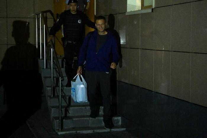Russian police have extended a crackdown on the opposition by raiding the offices of independent politicians on the eve of a protest rally; earlier this week Russian opposition leader Alexei Navalny, pictured, left a court after being sentenced to 30 d...