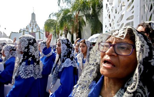 Followers of the Light of the World, a Mexican Pentecostal church whose controversial leader has been arrested, attend its annual gathering in Guadalajara on August 9