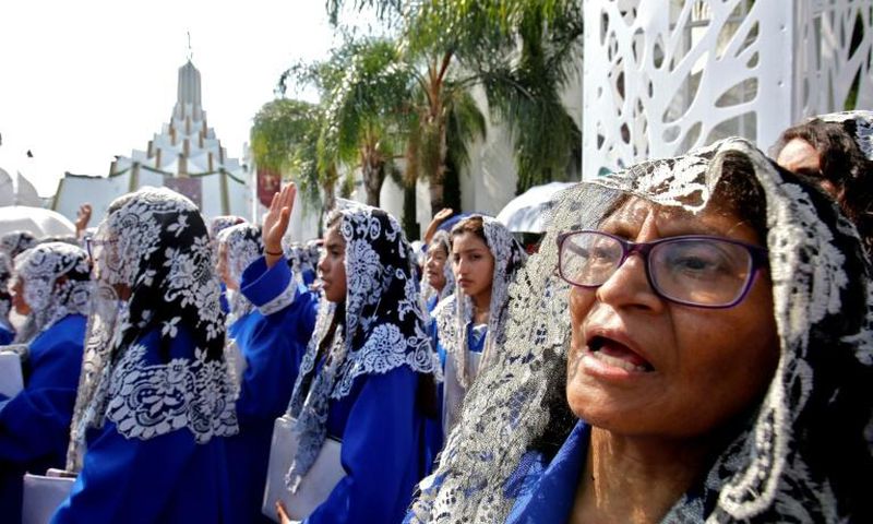Followers of the Light of the World, a Mexican Pentecostal church whose controversial leader has been arrested, attend its annual gathering in Guadalajara on August 9