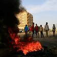 Talks are to resume Tuesday between Sudanese protesters and ruling generals on remaining issues related to installing a transitional civilian administration, a mediator and a protest leader have said; pictured -- Demonstrators burn tires in Khartoum on...