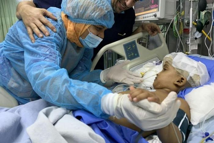 The girls were separated in a marathon operation by a huge team of Hungarian and Bangladeshi doctors