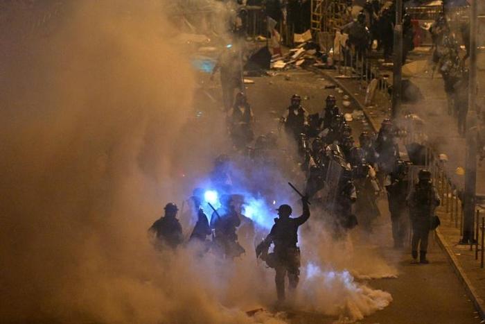 Hong Kong police retook parliament from protesters early Tuesday after firing tear gas to disperse hundreds who ransacked the building in a day of unprecedented chaos and political violence