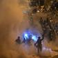 Hong Kong police retook parliament from protesters early Tuesday after firing tear gas to disperse hundreds who ransacked the building in a day of unprecedented chaos and political violence