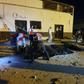 Emergency workers recover bodies after an air strike killed nearly 40 at Tajoura detention centre