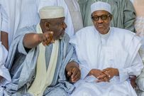 Rochas Okorocha (left) and President Muhammadu Buhari [The Sun Nigeria]