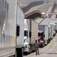 Facing five percent tariffs: Cargo truck drivers line up to cross to the United States at Otay commercial crossing in Tijuana, Mexico