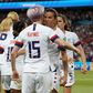 USA players celebrate with number 15 Megan Rapinoe after she scored in the 2-1 win over hosts France in the World Cup quarter-final