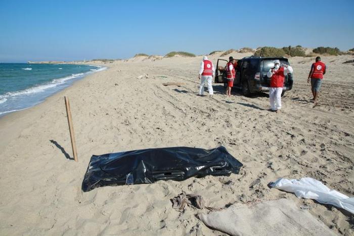 Members of the Libyan Red Crescent have been recovering the bodies