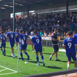 Bristol Rovers FC warm up in Junior Agogo tribute shirts