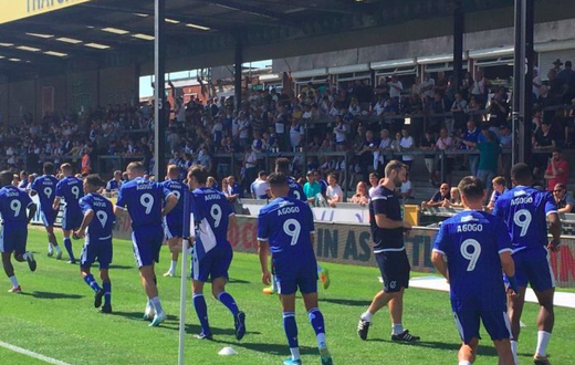 Bristol Rovers FC warm up in Junior Agogo tribute shirts