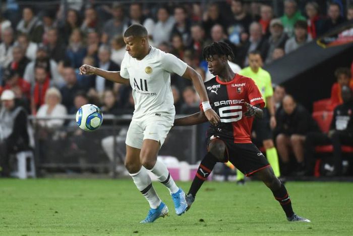 Rennes' Angolan teenager Eduardo Camavinga (R) pursues Paris Saint-Germain star Kylian Mbappe during a Ligue 1 match at the weekend