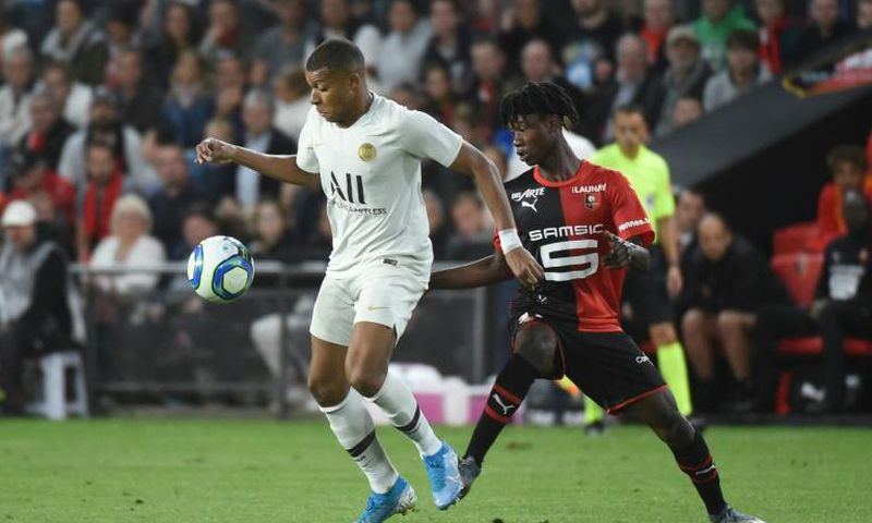 Rennes' Angolan teenager Eduardo Camavinga (R) pursues Paris Saint-Germain star Kylian Mbappe during a Ligue 1 match at the weekend