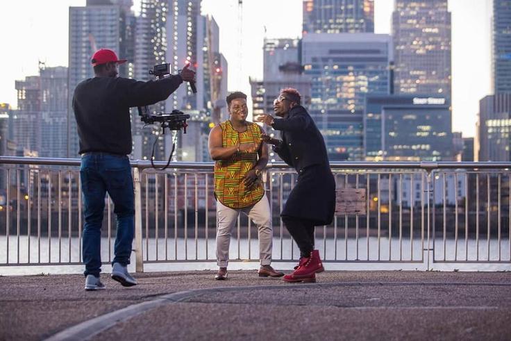 Kumi Guitar and Shatta Wale on set