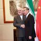 Chinese Foreign Minister Wang Yi shakes hands with Iranian Foreign Minister Mohammad Javad Zarif at the Diaoyutai State Guesthouse in Beijing