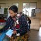 A woman casts her vote at a polling station in San Pedro Sacatepuez, Guatemala, on June 16, 2019
