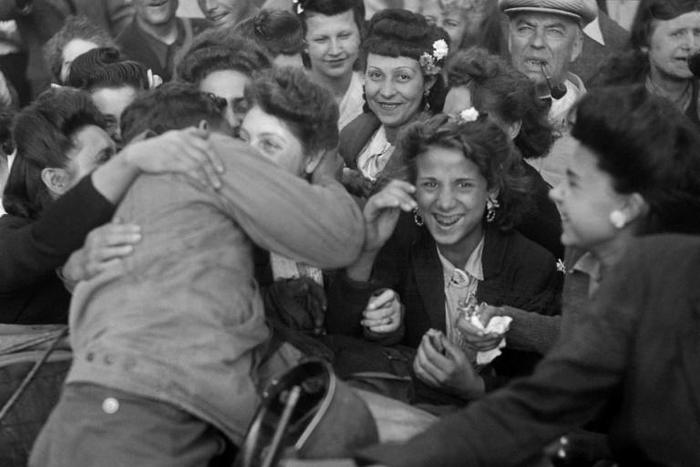 Parisians celebrate the liberation of the capital on August 25, 1944, less than three months after D-Day