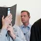 Defendant Andreas V. (L) is suspected of 298 sex crimes against 23 children at a campground in Luegde, western Germany