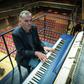 It is believed to be the world's largest vertical piano which stands one metre taller than the current World Record holder.