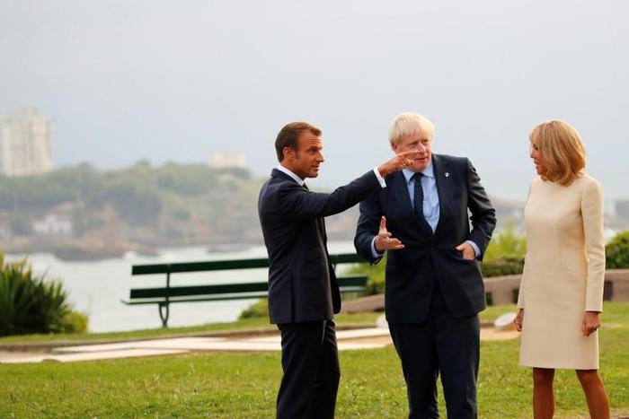 Johnson said he didn't want to get into "any post-Brexit eschatology" with Donald Tusk before touching down in Biarritz where he was welcomed by French President Emmanuel Macron and his wife Brigitte