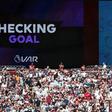 The big screen informs the crowd that the VAR is checking Manchester City's third goal at West Ham