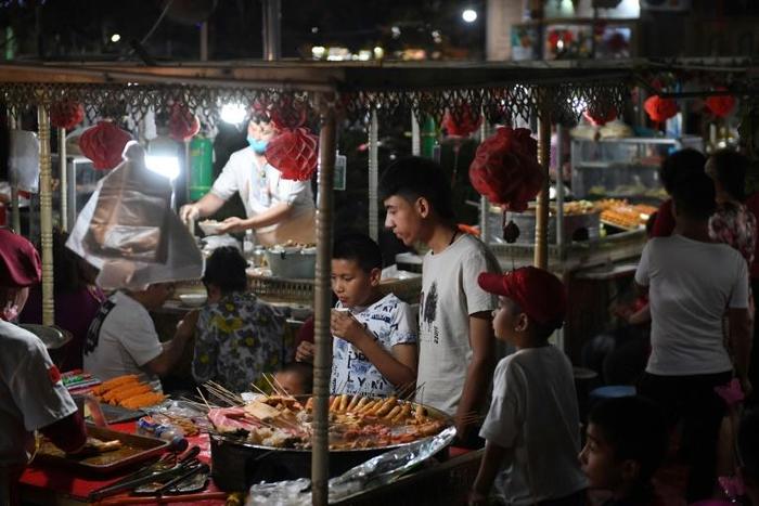From the expansive dunes of the Taklamakan Desert to the snow-capped peaks of Tianshan, Chinese authorities are selling troubled Xinjiang as a tourist idyll, welcoming travellers even as they send locals to internment camps