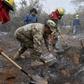 Soldiers, firemen and volunteers combat forest fires near Robore in eastern Bolivia, on August 25, 2019