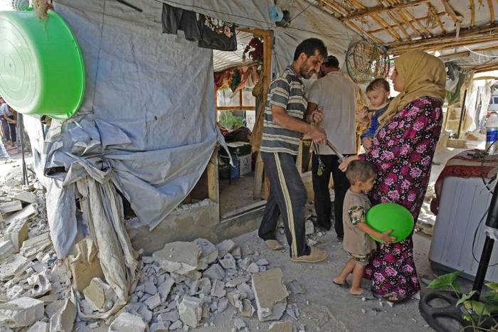 Keen not to encourage Syrian refugees to settle permanently in Lebanon, authorities allow only informal camps for refugees
