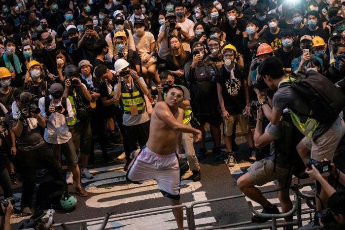 Well-known activist Ho-chiu Pun was seen throwing multiple eggs at the police headquarters last month