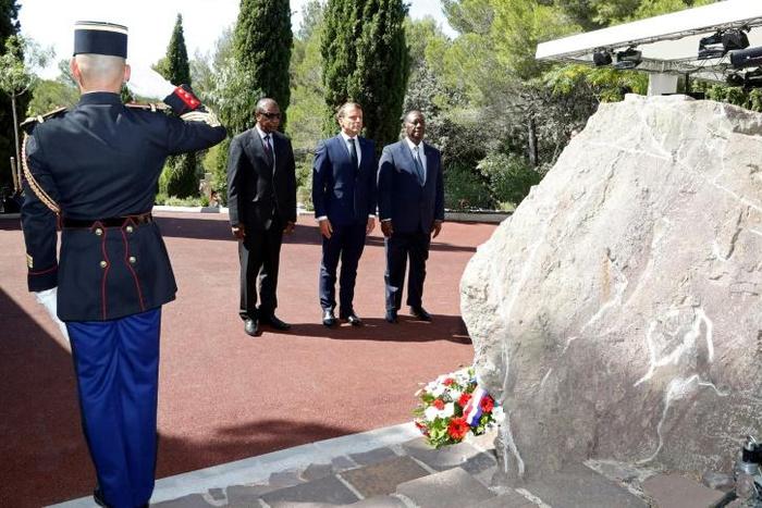 (LtoR) The leaders of Guinea, France and Ivory Coast attend a ceremony marking the 75th anniversary of the Allied landings in Provence during World War II on Thursday