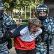 Russian National Guard officers detain protesters following a rally calling for fair elections in Moscow