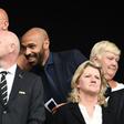 Gianni Infantino (3L), seen attending the women's World Cup semi-final between England and the USA, proposed expanding the tournament to 32 teams