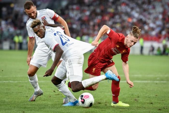Teenager Harvey Elliott (R) signed for Liverpool last week.