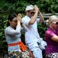 Czech nationals Sabina Dolezalova (2nd R) and her boyfriend Zdenek Slouka (2nd L) took part in a purification ritual in Bali after a disrespectful online video they posted went viral