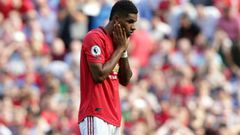 Manchester United striker Marcus Rashford reacts after mssing his penalty