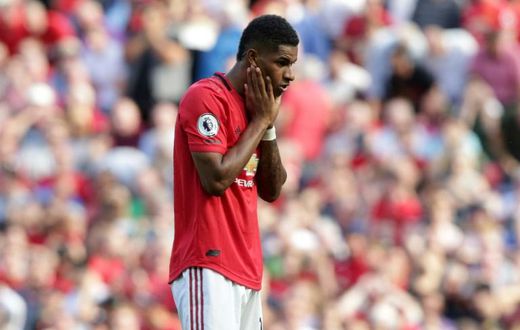 Manchester United striker Marcus Rashford reacts after mssing his penalty