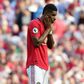Manchester United striker Marcus Rashford reacts after mssing his penalty