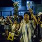 Overnight, a group of around 2,000 protestors held a vigil outside the government offices, with some singing hymns