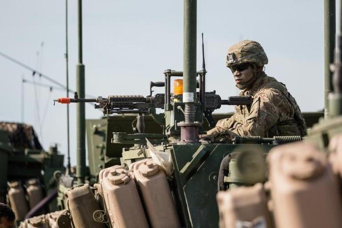 An American soldier is pictured during NATO military exercises on June 16, 2017 in Orzysz, Poland